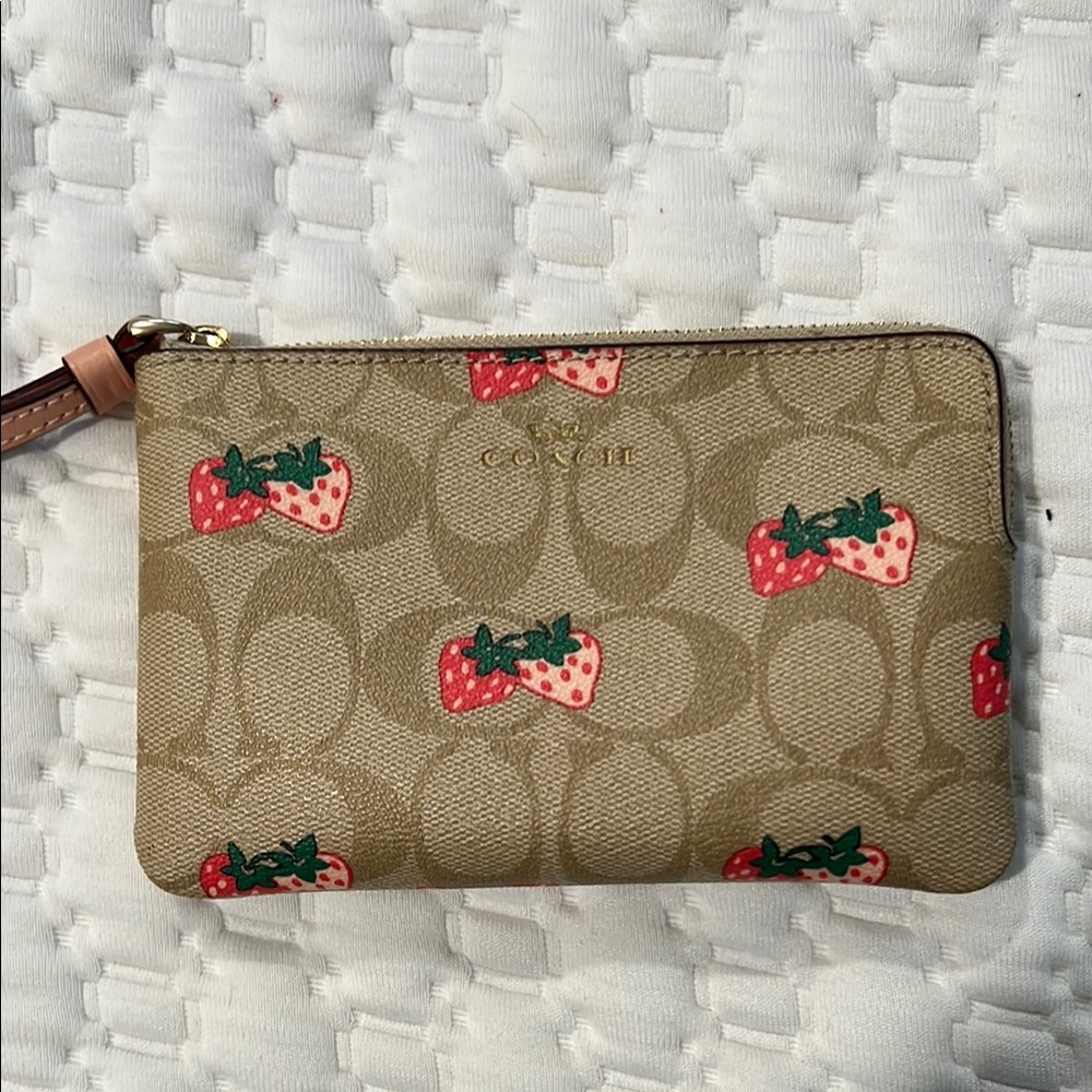 Coach Beige Wristlet with Strawberry Design